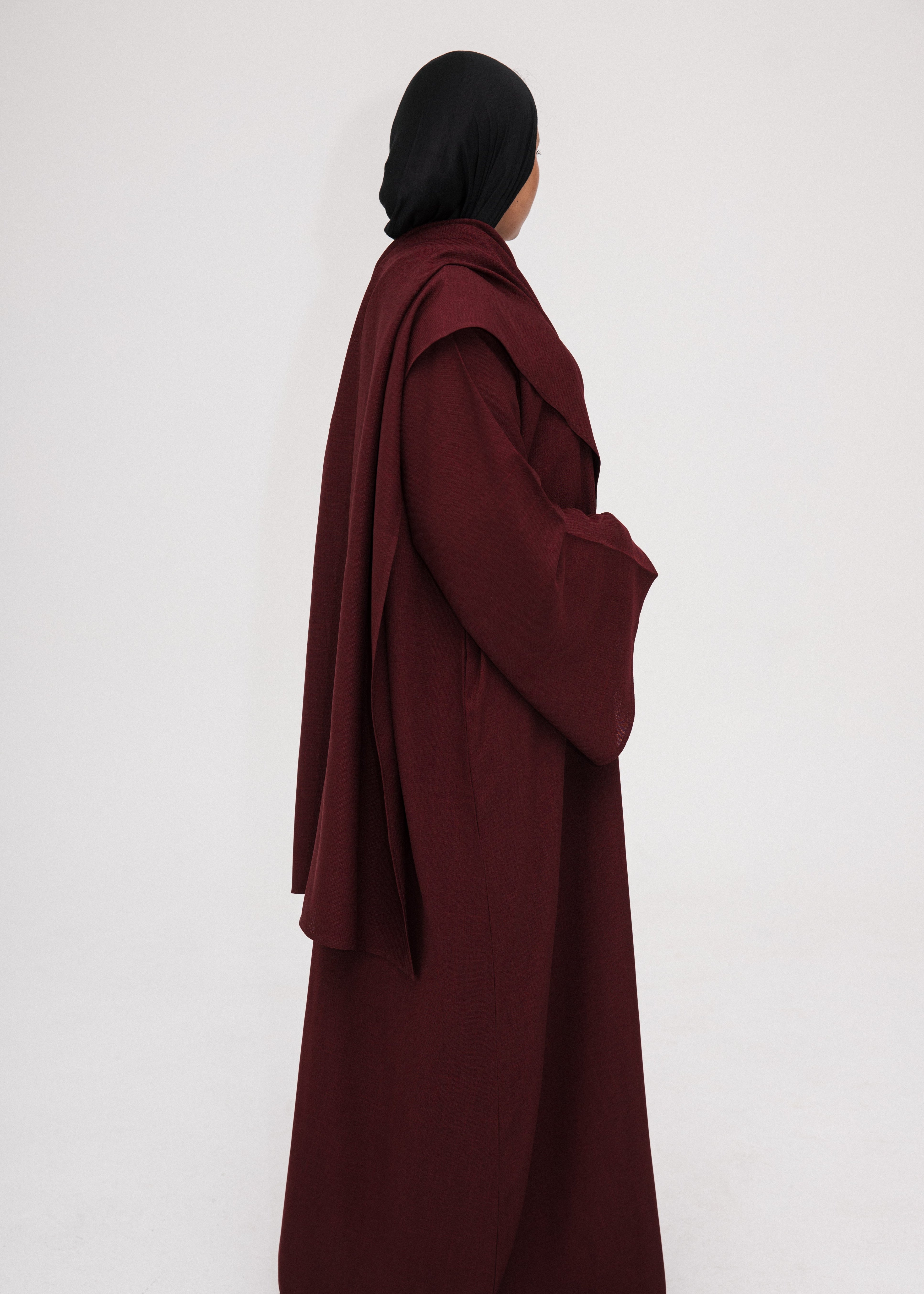 Burgundy Asymmetric Shawl Abaya | Nida Linen Fabric | Asymmetric Shawl Design | Concealed Buttons | Flowing Silhouette | Casual & Formal Style