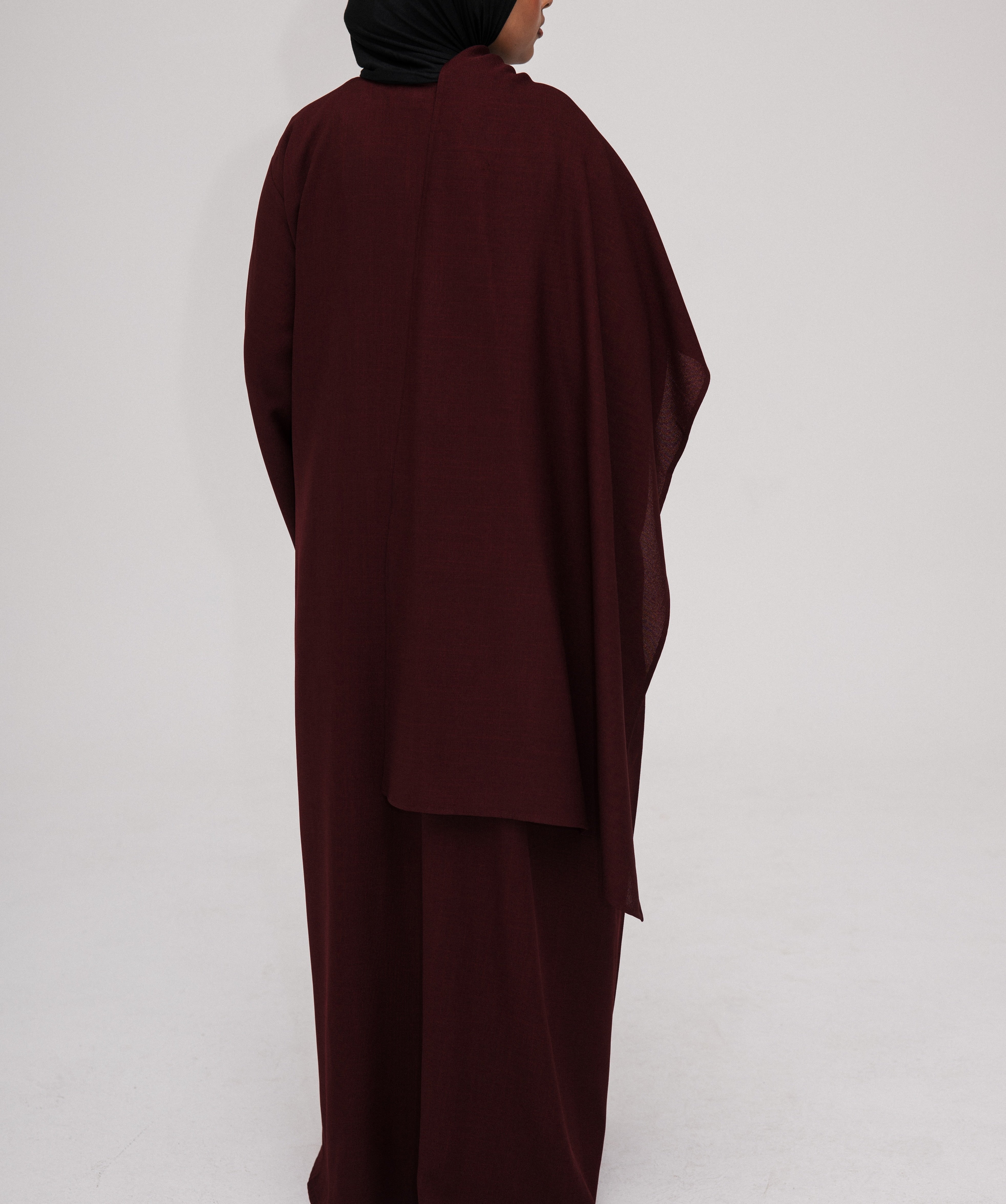 Burgundy Asymmetric Shawl Abaya | Nida Linen Fabric | Asymmetric Shawl Design | Concealed Buttons | Flowing Silhouette | Casual & Formal Style